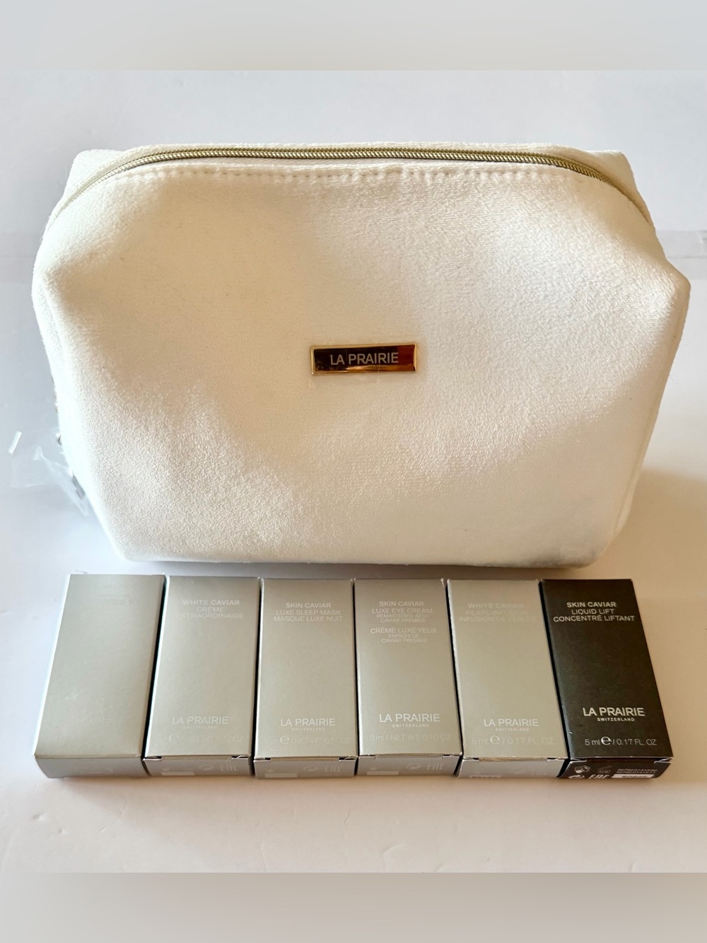 La Prairie White Cosmetic Pouch with Gold Logo Plaque